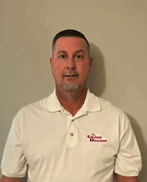 cure_all_white_background_1024x1024@2x Man in white shirt with company logo